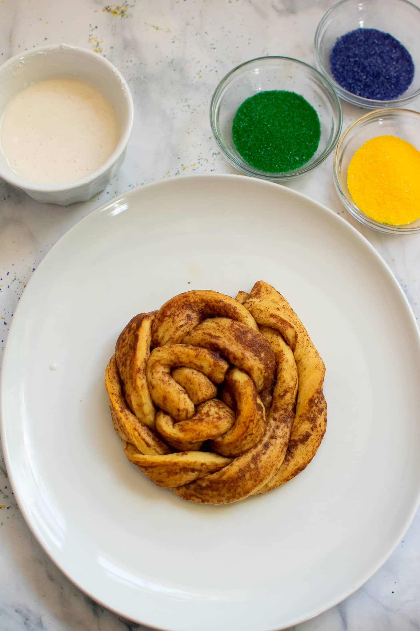 Easy DIY Mini King Cake made with cinnamon rolls