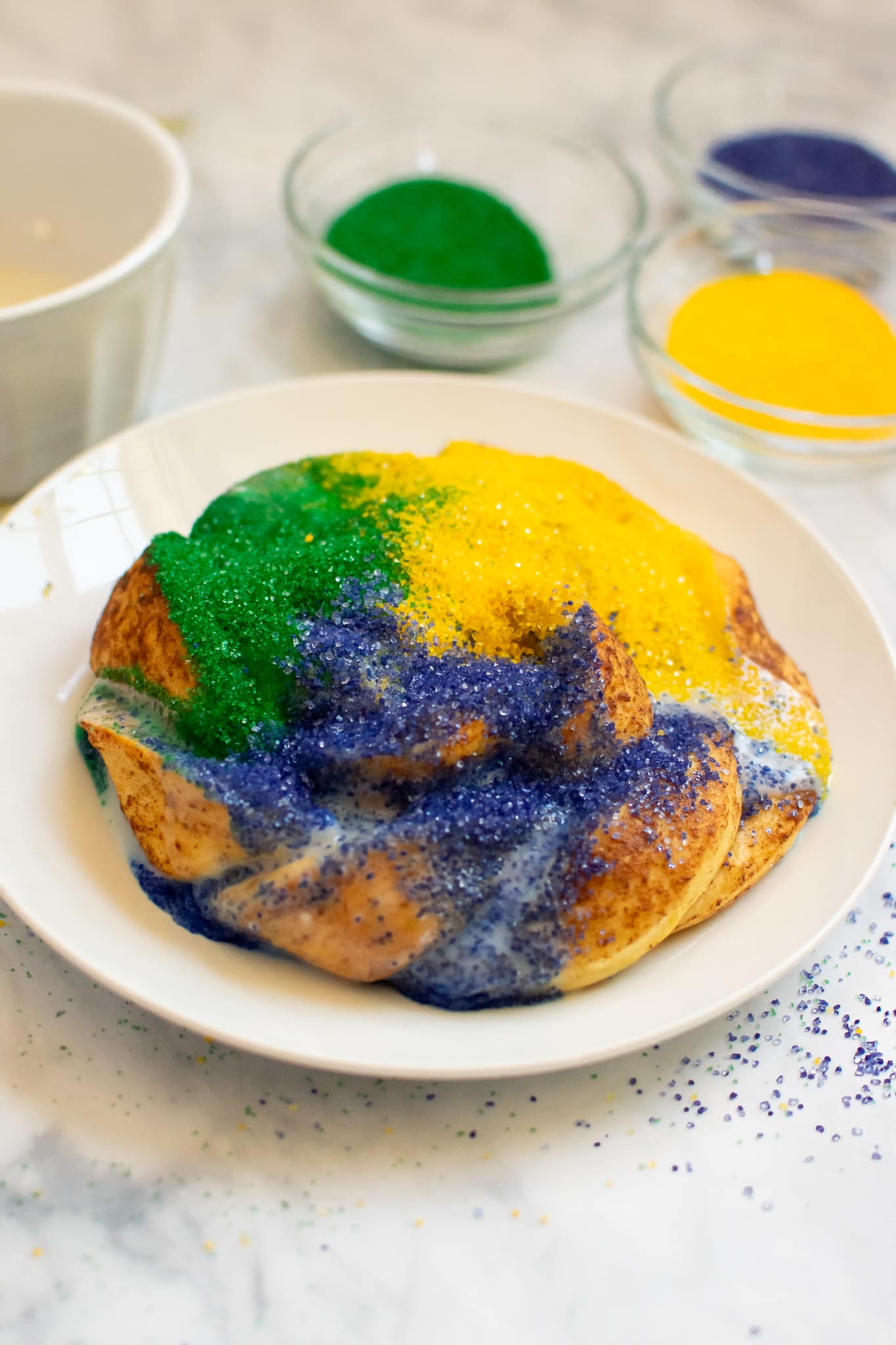 Easy DIY Mini King Cake made with cinnamon rolls