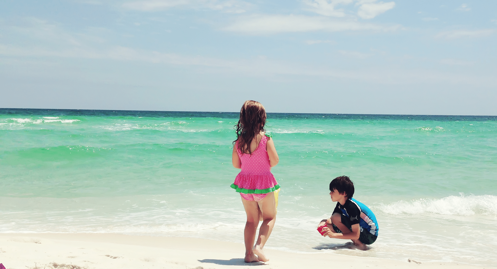 Children playing on the beach in Destin Florida